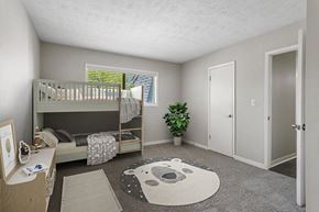 Peachtree Corners apartment for rent - Model Bedroom with Carpet, Closet and Window View at Lakeside Retreat Apartments located in Peachtree Corners, GA.
