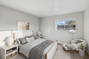 Tucson apartment for rent - Model Bedroom with Carpet and Window View at Tanque Verde Apartments located in Tucson, AZ.