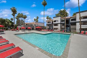 Mesa apartment for rent - Community Swimming Pool with Pool Furniture at Country Club Verandas Apartments located in Mesa, AZ.