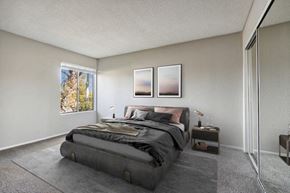 El Cajon apartment for rent - Model Bedroom with Carpet & Window View at Forest Park Apartments in El Cajon, CA.