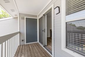 Aurora apartment for rent - Model Balcony leading from the living room with a sliding door.