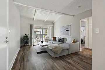 El Cajon apartment for rent - the living room of an apartment with a couch and a table