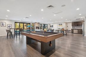 Aurora apartment for rent - Community Clubhouse with Lounge Furniture and Pool Table Area at Liberty Creek Apartments in Aurora, CO.