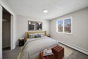 Glendale apartment for rent - Model Bedroom with Carpet and Closet at Esprit at Cherry Creek Apartments in Glendale, CO.