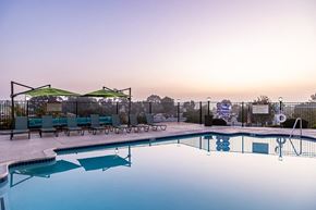 Carlsbad apartment for rent - Community Swimming Pool with Pool Furniture at Santa Fe Ranch Apartments located in Carlsbad, CA.