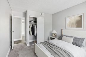 Las Vegas apartment for rent - a bedroom with a bed and a closet