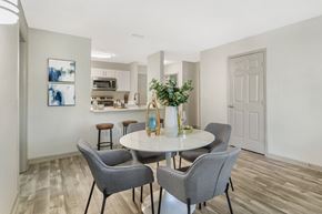 Jacksonville apartment for rent - A dining room with a table and chairs.