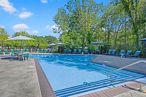 Shrewsbury apartment for rent - Shrewsbury, MA Apartments Near Westfield Mall - Commons at Haynes Farm - Sparkling Swimming Pool With Sundeck, Lounge Chairs, Shade Umbrellas, And Tree Lined Views Around The Deck