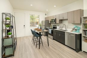 Mesa apartment for rent - a kitchen and dining area in a 555 waverly unit