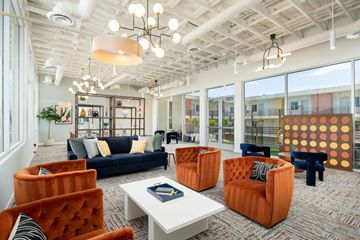Mesa apartment for rent - a living room with couches and chairs and a table