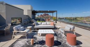 Scottsdale apartment for rent - Rooftop lounge with chairs and fireplace