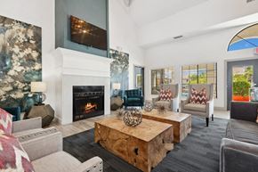 Phoenix apartment for rent - Community clubhouse with lounge area at Lore South Mountain, Phoenix, AZ, 85044