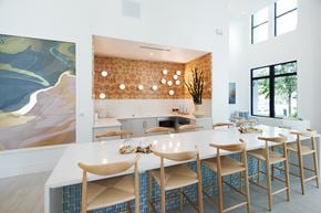 Tampa apartment for rent - Community indoor clubhouse kitchenette and seating area at The Brooke at Rocky Point in Tampa, Florida.