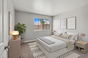 Las Vegas apartment for rent - a bedroom with a bed and a window
