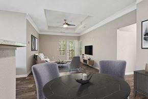 Stockbridge apartment for rent - Model apartment dining room with a table and chairs