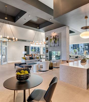 Business center with coworking spaces, individual desks, & conference room