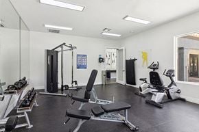 Las Vegas apartment for rent - Apartments Near Nellis Air Force Base - Monterra - On Site Fitness Center With Weight Machines, Free Weights, Recumbent Bikes, And Bright Overhead Lighting