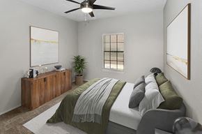 Dallas apartment for rent - 1 Bedroom Luxury Apartments in North Dallas, TX - Dallas North Park - A Bedroom With Wood Bed Frame, Ceiling Fan, Soft Bedding, Wall Art, And Window With Blinds.