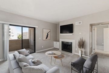 Las Vegas apartment for rent - a living room with a couch and a fireplace
