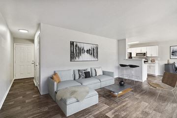 Las Vegas apartment for rent - a living room with a couch and a table