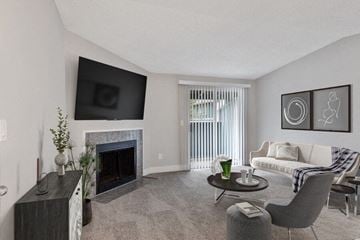 Federal Way apartment for rent - a living room with a couch and a fireplace