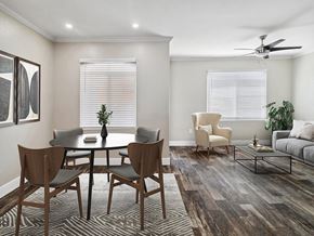 Moreno Valley apartment for rent - A dining room with a round table and chairs.
