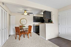 Lakewood apartment for rent - A dining room with a table and chairs.