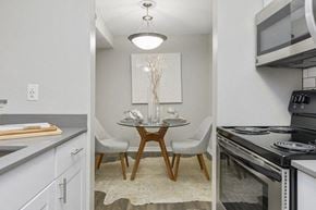 Tampa apartment for rent - Model kitchen with view of dining area
