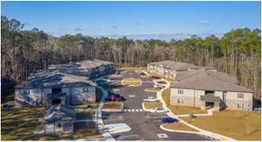 Satsuma apartment for rent - A bird's eye view of a residential area with houses and cars at Arbours at Satsuma Apartments, Alabama