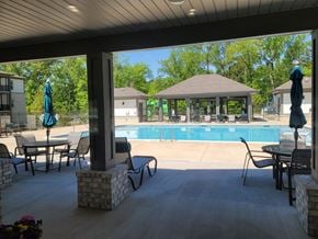 Covington apartment for rent - A patio with a pool and a gazebo.