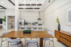 Baton Rouge apartment for rent - A dining room with a wooden table and chairs at The Addison, Baton Rouge