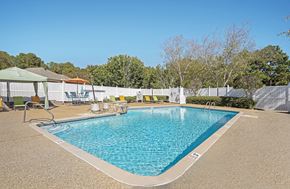 Ridgeland apartment for rent - Swimming Pool with sitting area at Arbors at Natchez Trace Apartments, Ridgeland, MS
