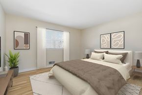 Chatham apartment for rent - A bedroom with a large bed and two framed pictures on the wall. at Chatham Hill, New Jersey, 07928