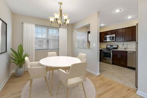 Chatham apartment for rent - A dining room with a white table and chairs. at Chatham Hill, New Jersey, 07928