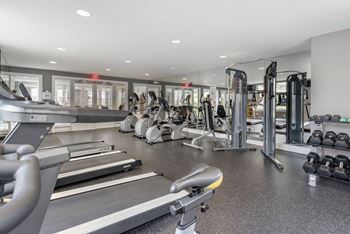 Fitness center with treadmills and weight machines