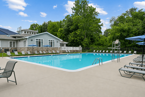 Rosedale apartment for rent - A pool with a house in the background.