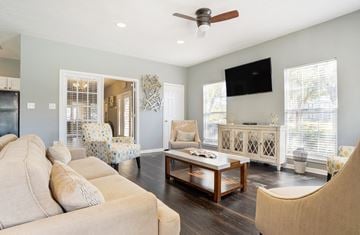 Pearl apartment for rent - a living room with a couch and a coffee table