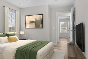 Pearl apartment for rent - A bedroom with a large bed and a painting on the wall at Grand at Pearl Apartments, Pearl, MS 39208
