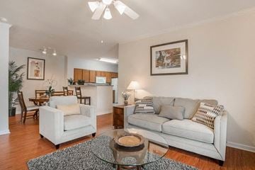 Slidell apartment for rent - a living room with a couch and a glass table