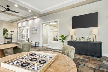 Norfolk apartment for rent - A living room with a wooden table and a carpeted floor.