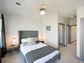 Baton Rouge apartment for rent - a bedroom with a bed and two nightstands at The Addison, Baton Rouge, Louisiana
