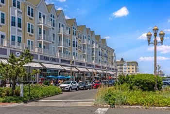Boardwalk shopping district with restaurants and storefronts