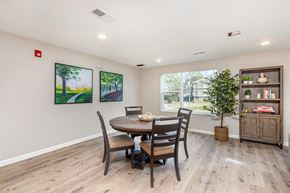 Charlotte apartment for rent - A dining room with a table and chairs.