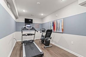 Cedar Rapids apartment for rent - our apartments have a gym with equipment and a flat screen tv