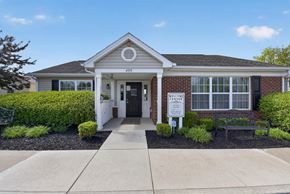 Walbridge apartment for rent - A building with a sign that says "Welcome Center" in front of it.