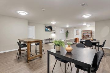 Columbus apartment for rent - a dining room and living room with a table and chairs