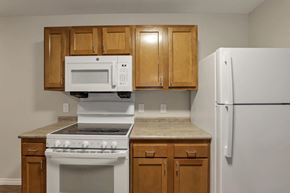 Columbus apartment for rent - a kitchen with a stove microwave and refrigerator