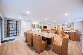 Whitehall apartment for rent - A conference room with a long table surrounded by chairs.
