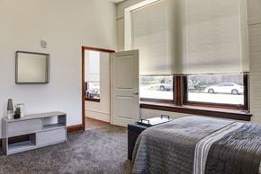 Circleville apartment for rent - a bedroom with a bed and a window
