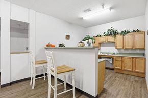 Marietta apartment for rent - A kitchen with white cabinets and a white counter top.